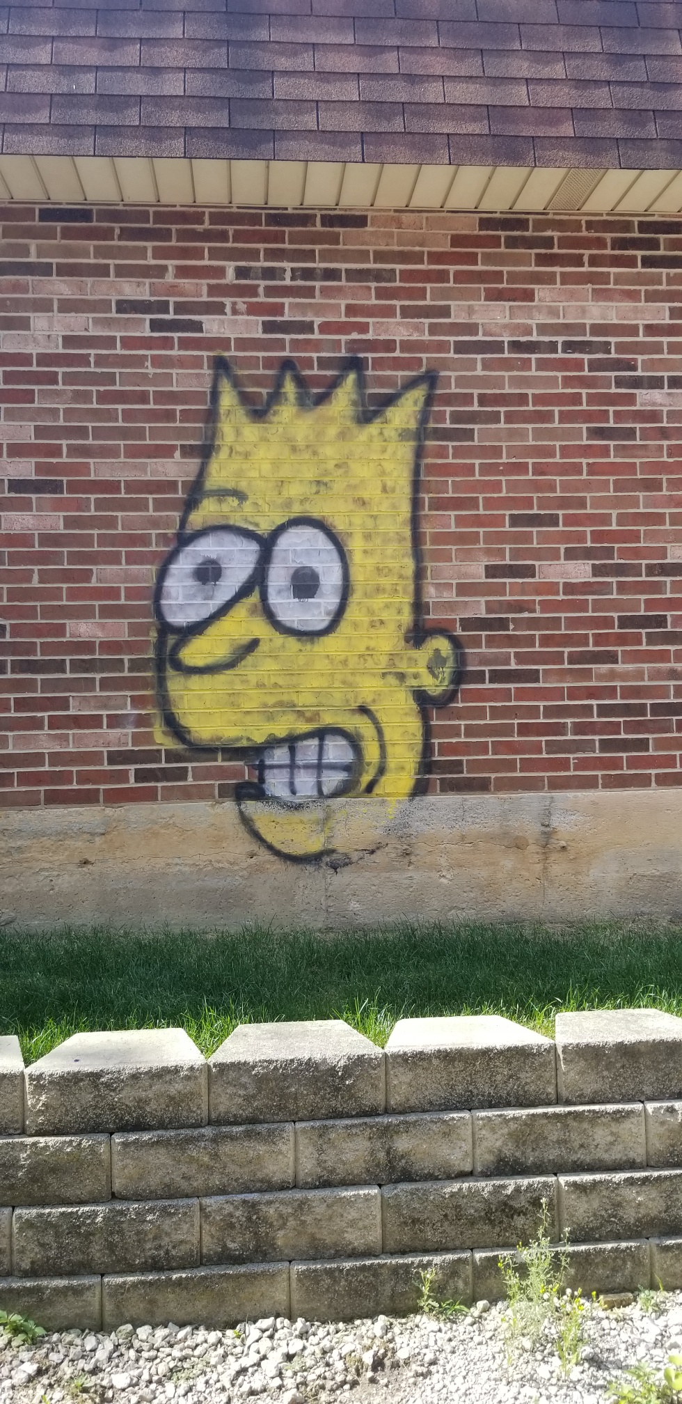Spray Paint of Bart on Brick Wall